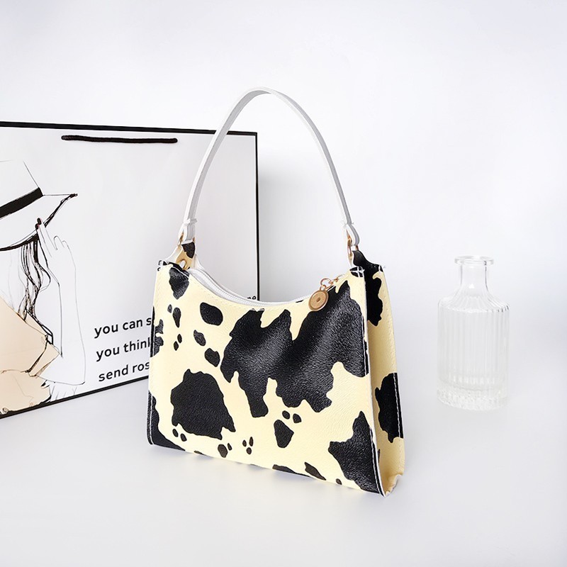 cow print mini purse